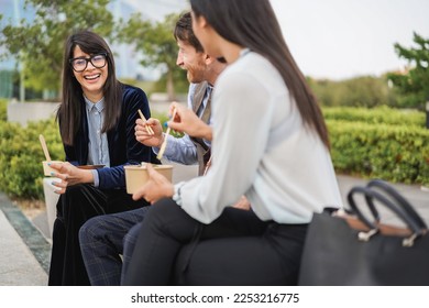 Business People Doing Lunch Break Outdoor From Office Building   Focus On Left Girl Face