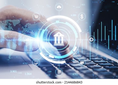 Close Up Of Hands Using Laptop Keyboard On Desktop With Creative Online Banking Hologram On Blurry Background Technology Fintech And Finance Concept Double Exposure