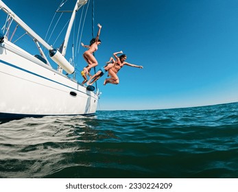 Happy Friends Diving From Sailing Boat Into The Sea   Travel And Summer Vacation Concept   Soft Focus On Blond Girl Face