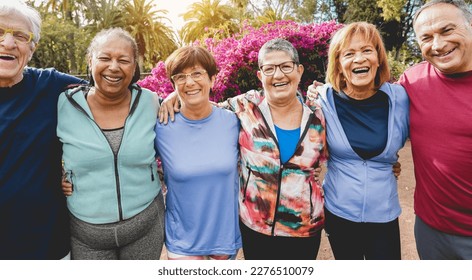 Multiracial Senior People Having Fun After Workout Exercises Outdoor With City Park In Background   Healthy Lifestyle And Joyful Elderly Lifestyle Concept