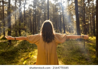 Nature Spirituality And Supernatural Concept   Young Woman Or Witch Performing Magic Ritual In Forest